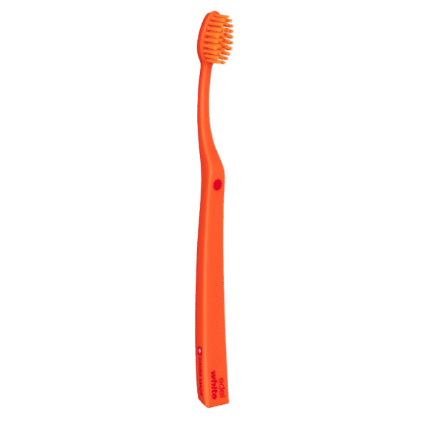 edel+white Soft Intensive Flosserbrush SWISS in PET box – Leicht, flexibel und mit soften, konischen Borsten. Abbildung Zahnbürste in orange