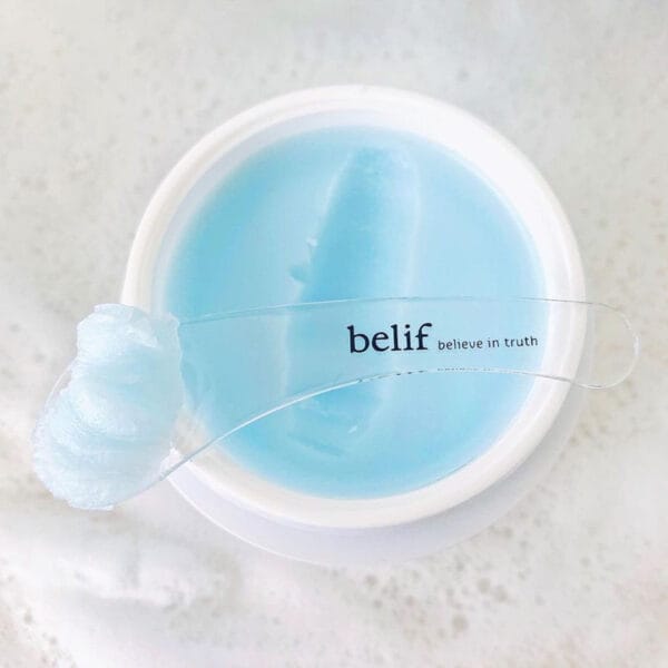 belif Cleansing Balm 100ml - Baume démaquillant hydratant à la fleur de lotus & vitamine E. Image avec applicateur, sans couvercle.