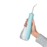 edel+white Flosserpik Power Spa - Le champion des douches buccales mobiles avec beaucoup de puissance. Illustration de la taille du produit. 