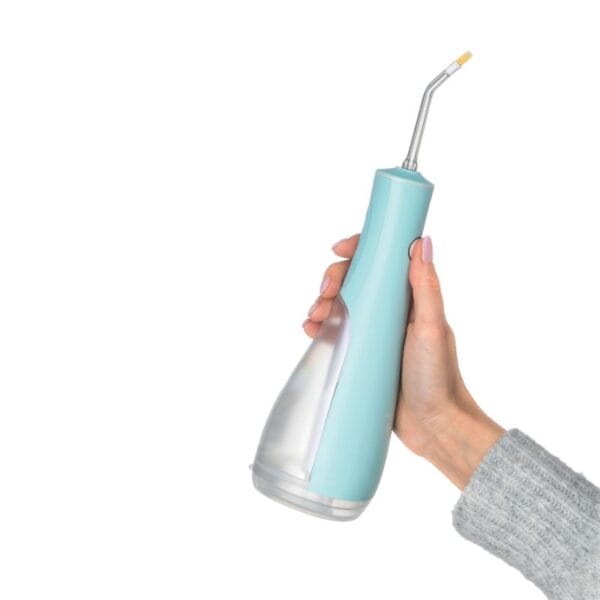 edel+white Flosserpik Power Spa - Le champion des douches buccales mobiles avec beaucoup de puissance. Illustration de la taille du produit. 